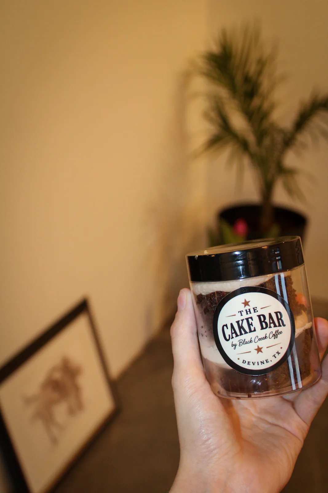 Dessert displayed beside the newly branded wooden bar
