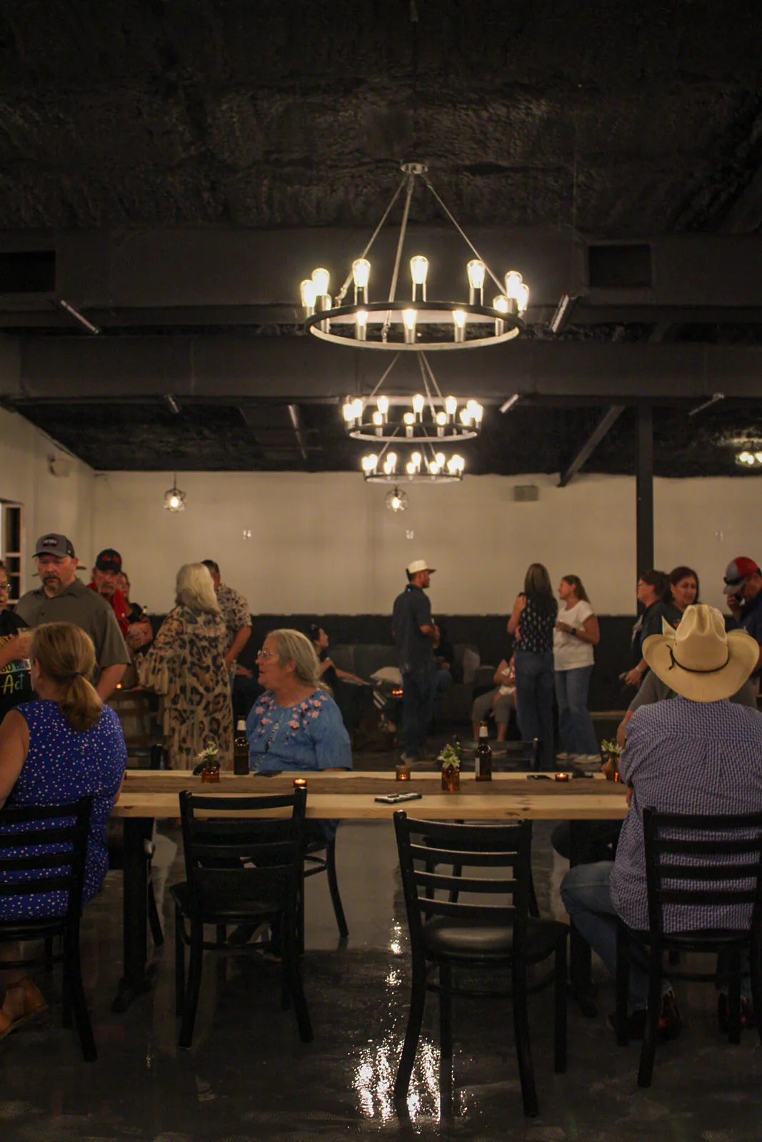 Tables and gathering areas arranged inside The Warehouse
